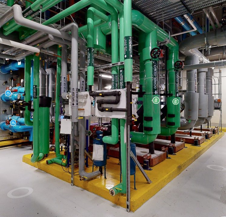 Mechanical room captured in 3D with overhead piping and labels